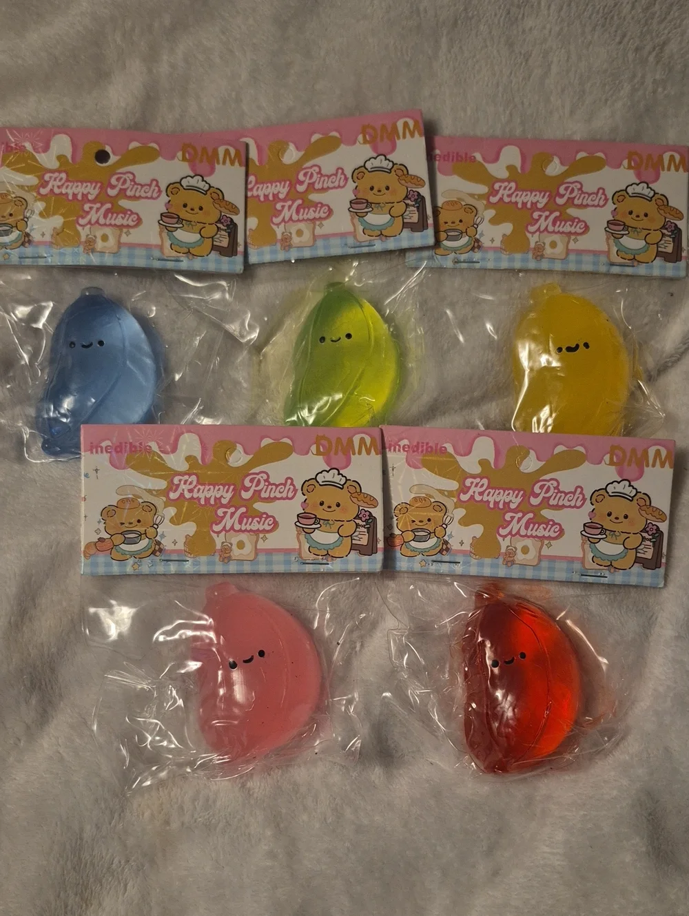 Happy Pinch Music Squeeze Toy Pack — Blue, Green, Yellow, Pink, Red